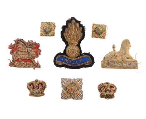 A small group of British army bullion-embroidered cap, collar and rank badges