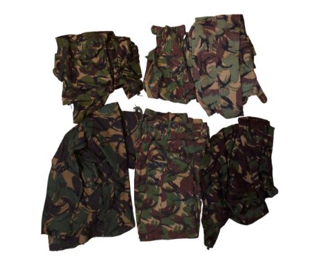 A large quantity of British army DPM clothing including Combat Smocks