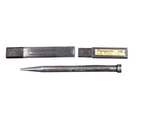 A white-metal "Life-Long" propelling pencil, engine turned and engraved "M Fowler", marked "Sterling", together with leads, 1