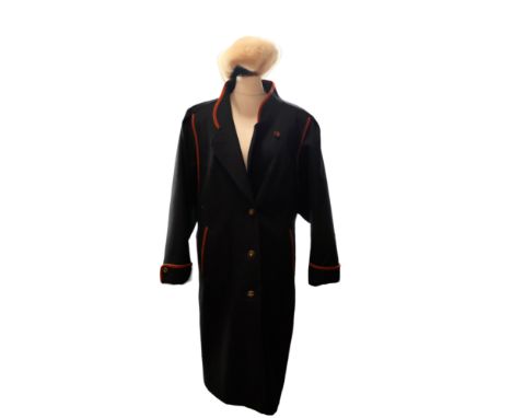 A vintage Bavarian Loden dress coat with detachable fur liner, together with a fur hat