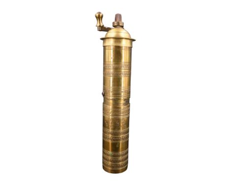 A Middle Eastern brass spice / coffee grinder, 26 cm 
