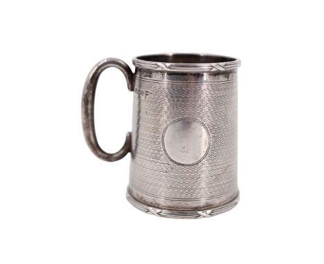 A George V silver christening cup, of tapering form having ribbon tied reed mouldings, engine turned overall with two vacant 