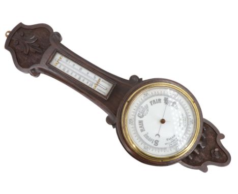 A early 20th Century carved oak banjo barometer, 64 cm 