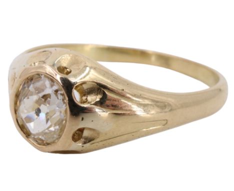 A diamond solitaire ring, the oval cut stone of approx 1 ct gypsy set on a heavy 18 ct yellow metal shank, X/Y, 6.5 g