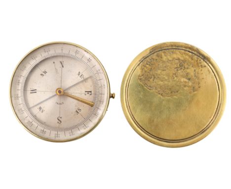 A late 19th / early 20th Century French brass pocket magnetic compass, 64 mm