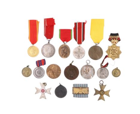 A group of Imperial German medals, comprising two 25 year veterans' crosses, a DKFA / Deutsche Krieger-Fechtanstalt, two Red 
