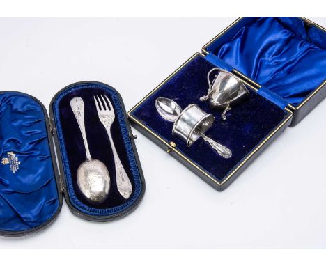Two cased silver Christening gift sets, including a spoon and fork, and an egg cup, spoon and napkin ring