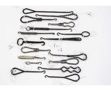 A collection of Victorian and later small metal button hooks, approx 17, various designs