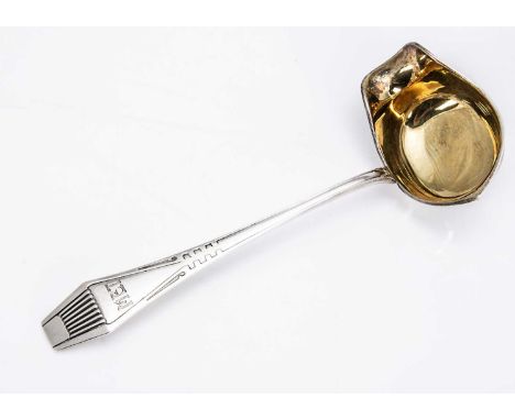 An Art Deco period Finnish sauce ladle, with stylish gilt bowl and initial MET to handle, 18cm long and 1.63 ozt