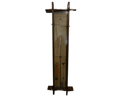 An oak cased Admiral Fitzroy barometer, with paper chart, containing a thermometer inscribed "Millar Bros. Seedsman, Hull, 10