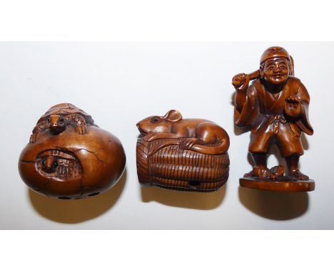 A Japanese carved wood netsuke, in the form of a turtle on an egg, character mark to the underside, 4 cm, another in the form