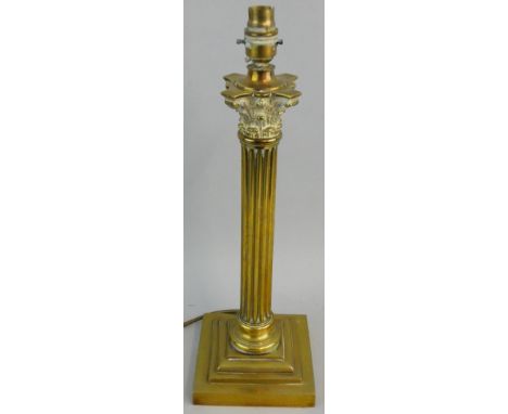 A Victorian brass Corinthian column table lamp, raised on a stepped base, height 44 cm.