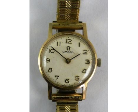 A 9ct gold ladies Omega manual wind wristwatch, London 1968, the silvered dial with Arabic numerals, 21 jewel movement, cal 6