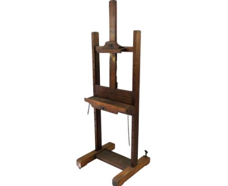 Of Fred Elwell, Walter Goodin and Kenneth Elwell interest; an oak artists adjustable easel, the rise and fall mechanism adapt