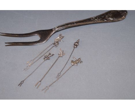 Victorian meat fork together with 6 continental silver cocktail sticks fork stamped 800