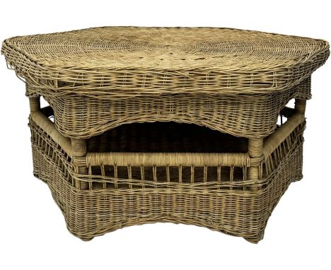 Mid-20th century hexagonal wicker coffee table, featuring woven top with pattern that radiates from the centre, lower shelf f