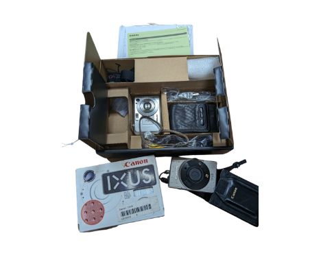 Casio Exilim EX-Z750 digital camera, and two Canon Ixus cameras, two examples boxed 