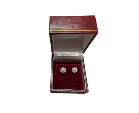 Pair of silver cubic zirconia flower stud earrings, stamped 925, boxed 