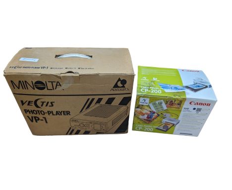 Minolta Vectis photo player VP1 and a Canon card photo printer CP-200, both boxed 