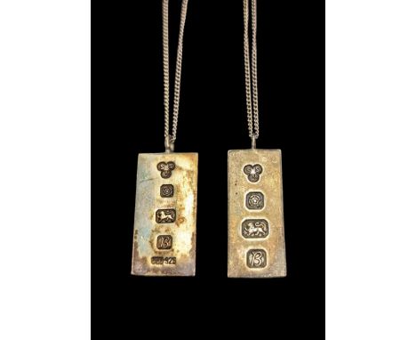 Two silver ingot pendantsCondition Report:Approx 74 grams