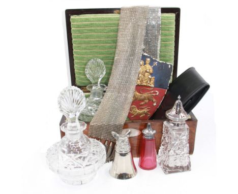 Two cut glass decanters, together with a faceted red glass bottle, cut glass sugar caster with pierced star cover, silver pla