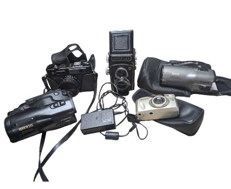 Two Canon Epoca video cameras, a Hacoflex twin lens camera, Yashica Electro 35 camera and a Kyocera Zoomate 140