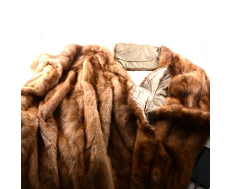 A full length dark mink coat, a light mink car coat, fur stoles, fox fur hat by Edna Wallace, a mink hat, two mink pelt tippe