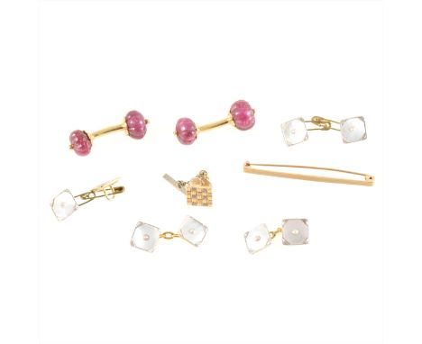 A collection of cufflinks and studs, a pair of fluted ruby coloured cufflinks with yellow metal bar connectors, diameter of s