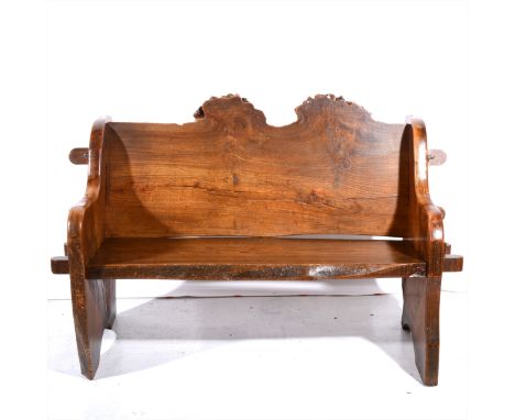 An elm bench, natural form cresting, pegged construction, length 142cm.
