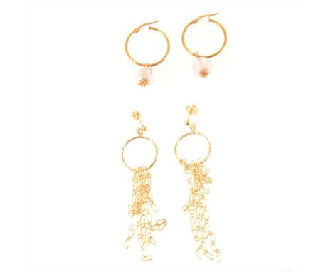 A pair of yellow metal earrings, textured hoop with seven tapered chain drops ranging from 28mm to 50mm long, post and butter