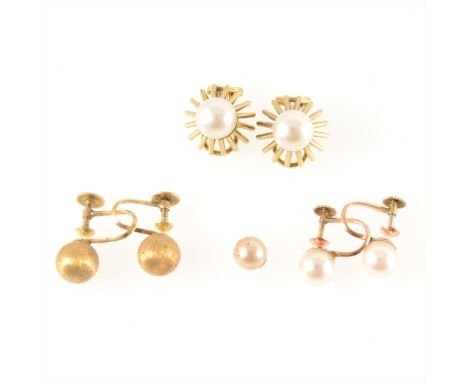 Three pairs of earrings, two set with cultured pearls, a pair of 8.5mm finely textured spherical beads, the screw fittings ma