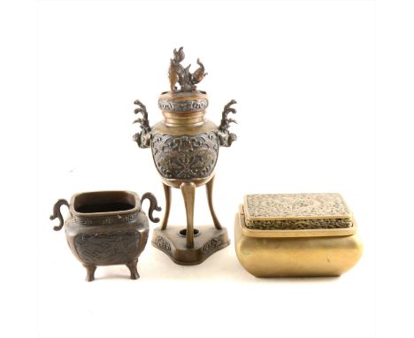 A Chinese bronze tripod censer, cast decoration, 26cm; a small bronze censer, cast seal mark; and a brass cricket box, pierce