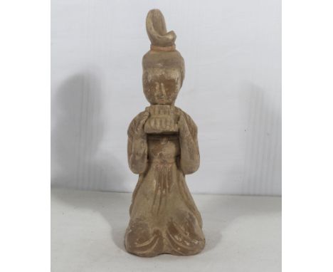 Tang dynasty style female figure playing pan pipes