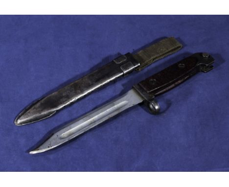 A WWII short bayonet stamped 3598 with scabbard and frog