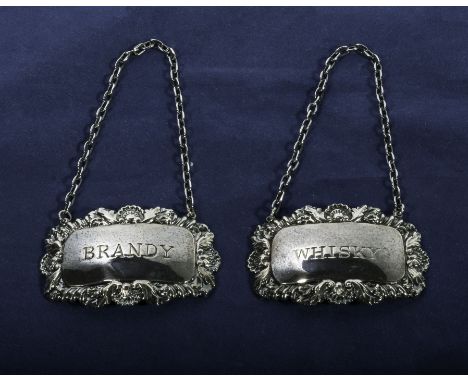 Two silver decanter labels Brandy and Whisky