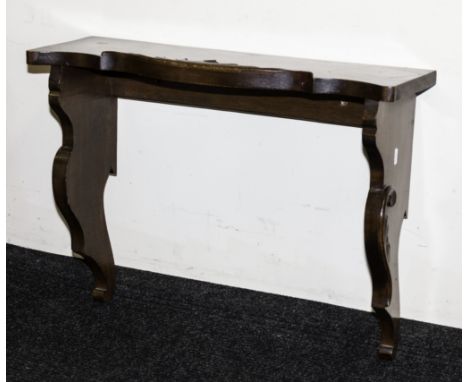 A mahogany wall bracket.