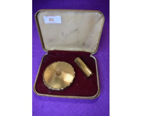 An art deco design Stratton make up set comprising of lip stick and machine tooled compact