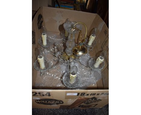 A six branch ceiling light candelabra style having lustre droplets and cut form