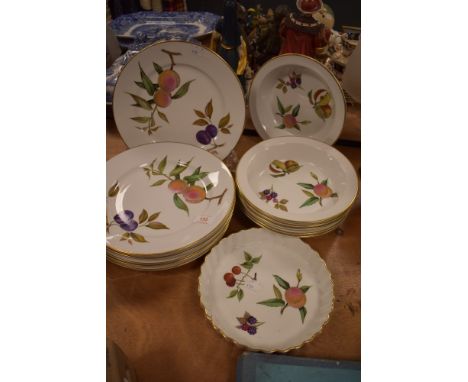 Six dinner plates, six soup bowls and a serving dish by Royal Worcester in the Evesham design