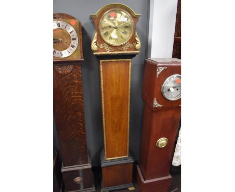 A lang cased grandmother clock having ormalu style decoration with gilt detail case