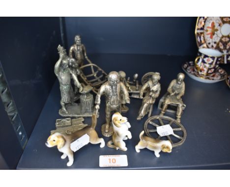 A selection of both metal cast and ceramic figures including small dogs