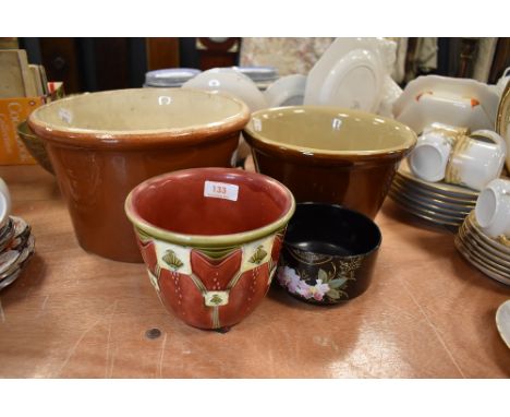 Two large salt glazed cream or butter bowls and two planters
both salt glazed bowls are in good order with minor firing inclu