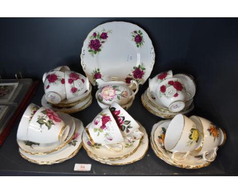 A part tea service by Colclough having various floral designs twelve tea cup and saucer sets plus extra