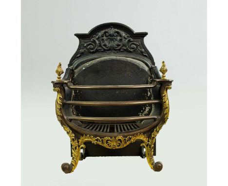 A VICTORIAN STYLE CAST IRON FIRE GRATE. with brass mounts and finials, 73cm high, 57cm wide, 32cm deep.
