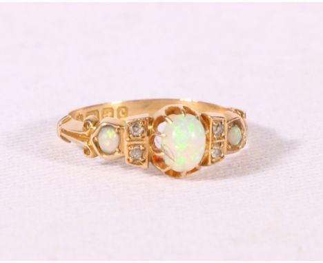 18ct yellow gold opal and diamond dress ring, size M, 2.5g. CONDITION REPORT: Birmingham 1851.  Clean condition, no obvious d