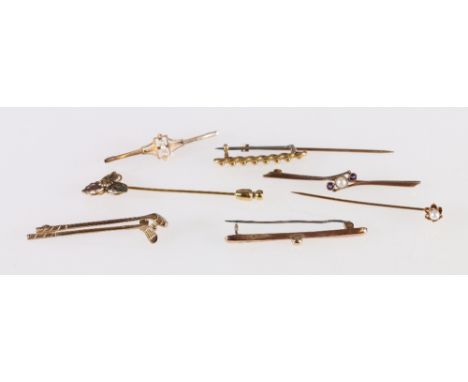 Five 9ct gold brooches, 10.8g gross and two stick pins.