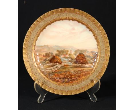 Royal Crown Derby Harrow cabinet plate 158 depicting the village of EYAM in Derbyshire, painted by E Trowell, 22cm diameter. 