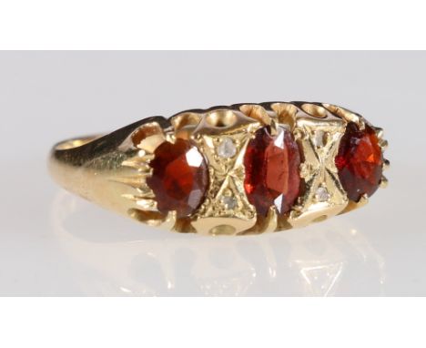 18ct gold ruby or garnet diamond dress ring, size P, 3.7g.