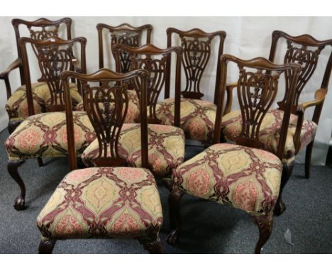 Set of eight Victorian mahogany Chippendale style dining chairs, raised on cabriole supports on ball and claw feet.