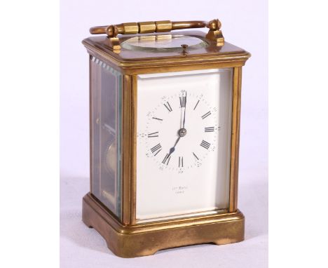 Henry Marc of Paris brass carriage clock with repeater, 18cm tall.   CONDITION REPORT:  The clock is ticking and strikes when